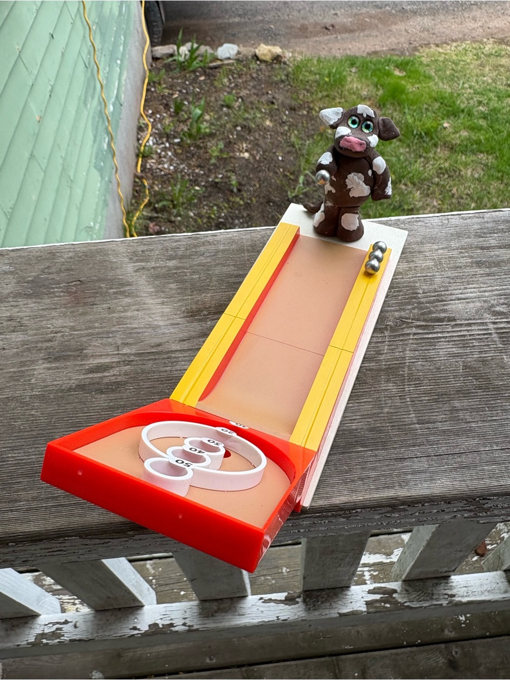 Cow Skee Ball Style Roll-and-Score decor Red and Yellow